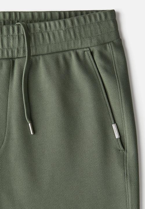 H&M - Slim fit twill joggers -  khaki green