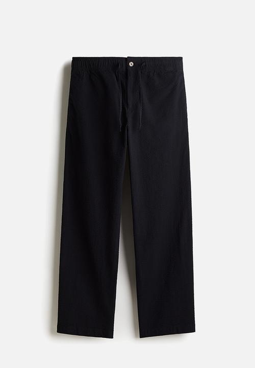 H&M - Relaxed fit seersucker trousers - navy blue