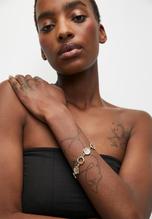 Rubi - Single bracelet- up gold swirl chain