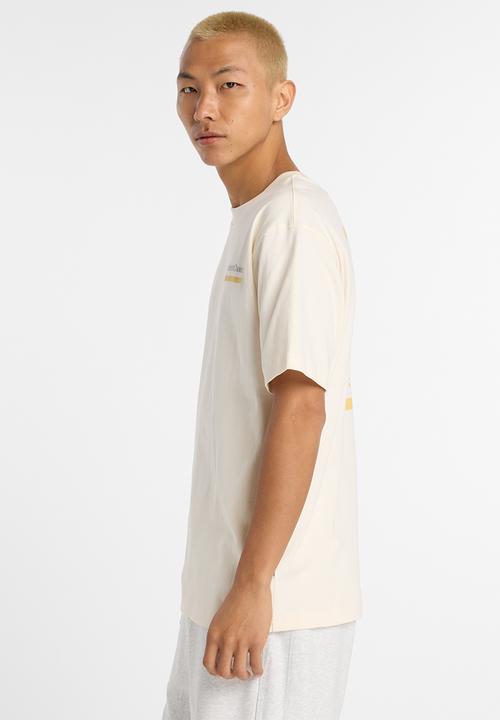 New Balance  - NB Athletics Intelligent Choice Tee - Cream/Multi