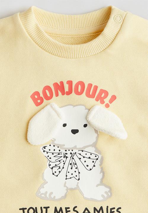 H&M - Sweatshirt - light yellow/bonjour