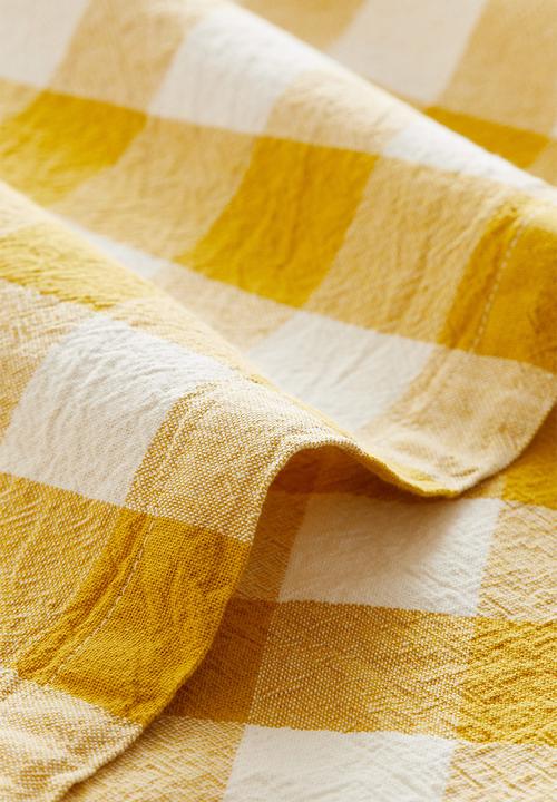 H&M - Patterned cotton tablecloth - dark yellow gingham check