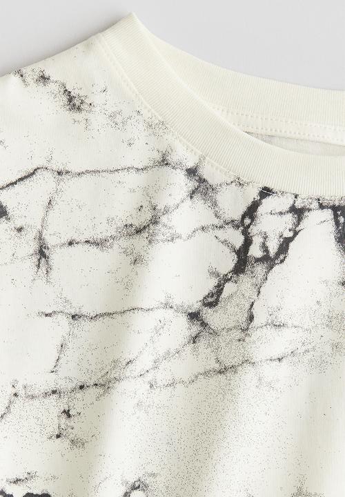 H&M - Printed cotton T-shirt - cream/marbled