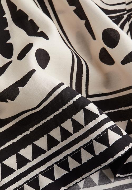 H&M - Wide drawstring trousers - cream & black patterned 