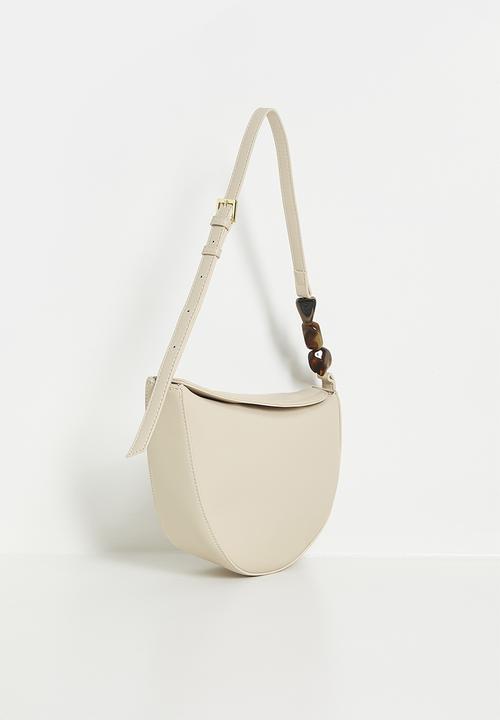 Tessa Design - Crescent shaped shoulder bag with beaded strap detail - cream