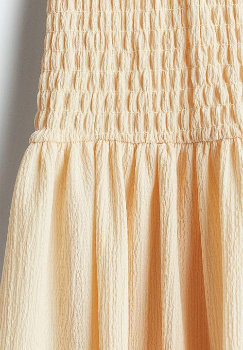 H&M - Smocked jersey dress - light beige