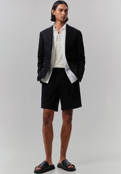 H&M - Relaxed fit linen-blend shorts - black