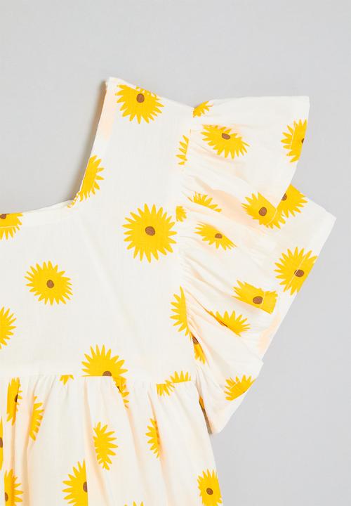 Pop Candy - Sunflower print top with ruffled sleeves - white