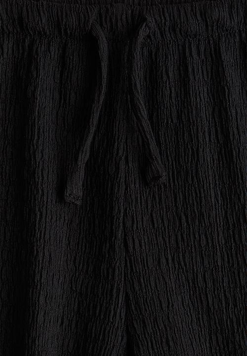 H&M - Textured jersey trousers - black