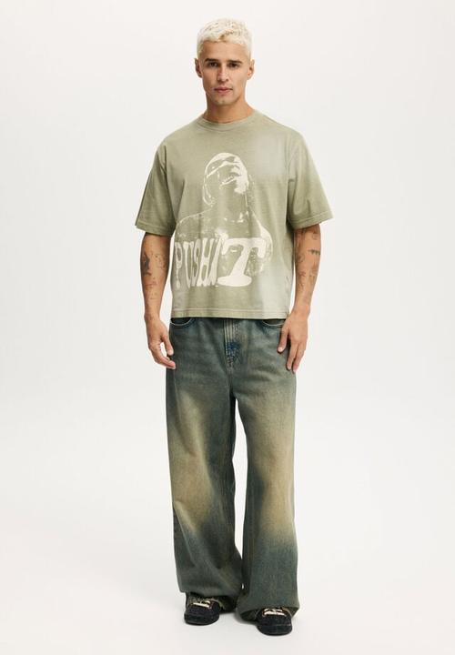 Cotton On - Cropped Fit Music T-Shirt - Lcn Bra Moss Stone