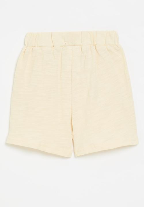 Pop Candy - Elasticated waist shorts with decorative button closure - ecru