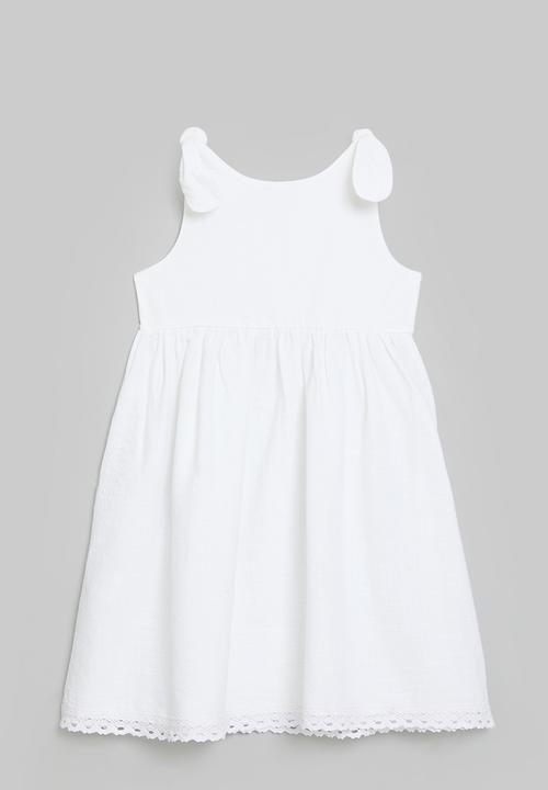 Pop Candy - Shoulder tie dress with lace trim hem - white