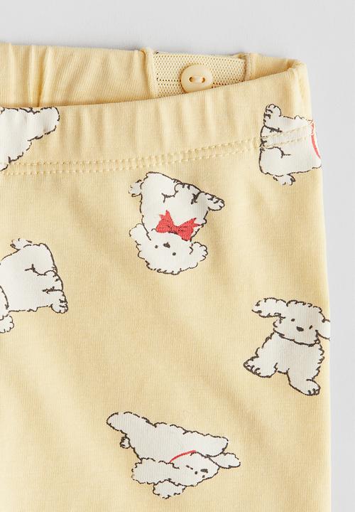 H&M - Printed cotton leggings - light yellow dogs