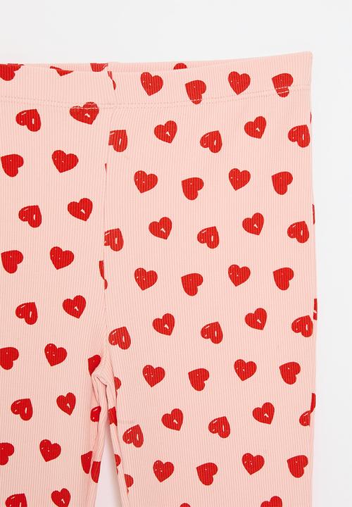 Pop Candy - Flared leggings - pink/hearts aop