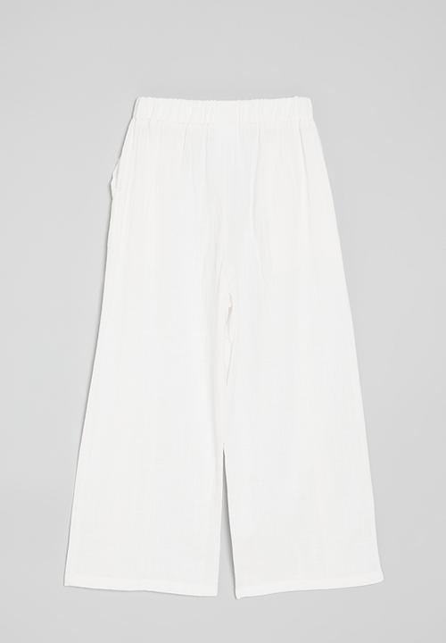Pop Candy - Wide leg pants with slanted inset pockets - white
