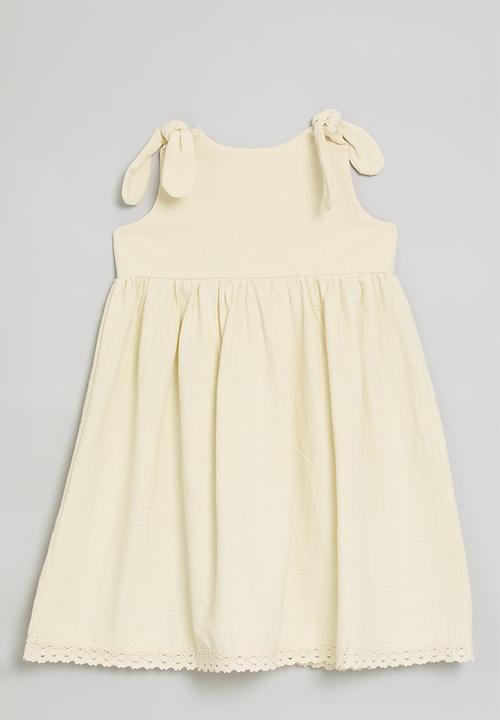 Pop Candy - Shoulder tie dress with lace trim hem - ivory
