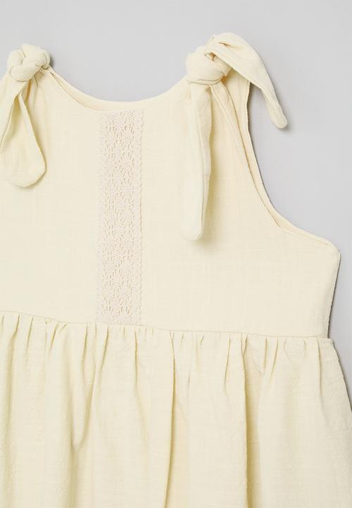 Pop Candy - Shoulder tie dress with lace trim hem - ivory