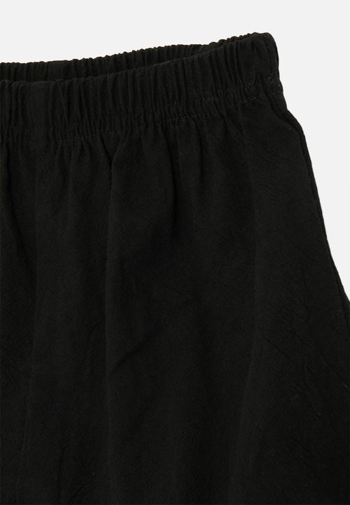 Pop Candy - Elasticated curved hem shorts - black