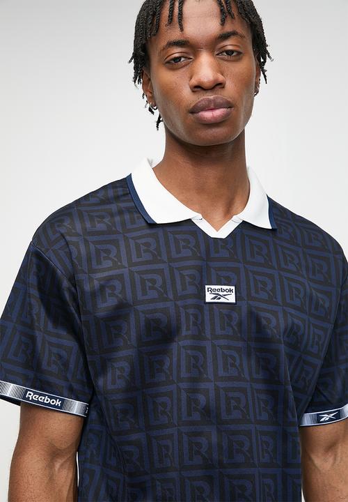 Reebok - Monogram Football Polo - Vector Navy Aop