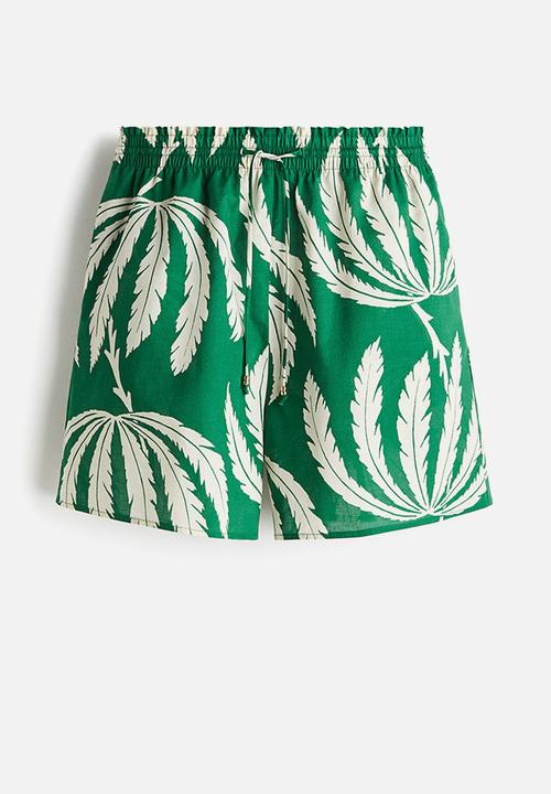 H&M - Printed drawstring shorts - green palm trees