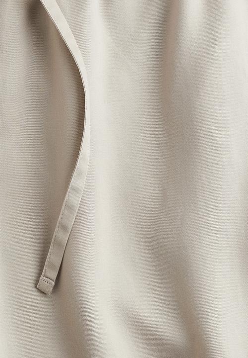 H&M - Relaxed fit lyocell trousers - beige
