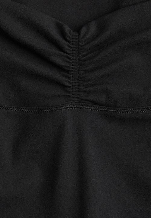 H&M - Flared yoga leggings with softmove™ lycra® - black