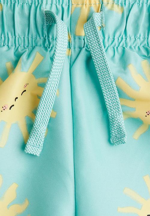 H&M - Printed swim shorts - turquoise/suns