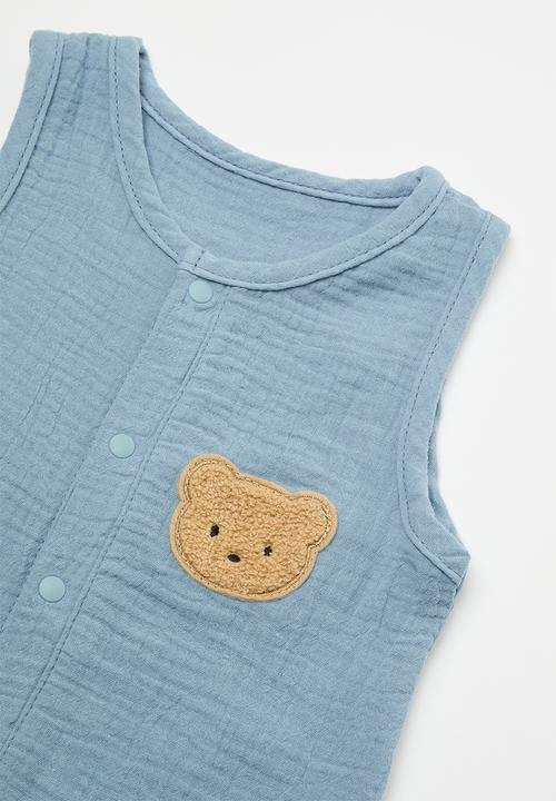 Pop Candy - Crinkled cotton romper with textured bear badge - blue