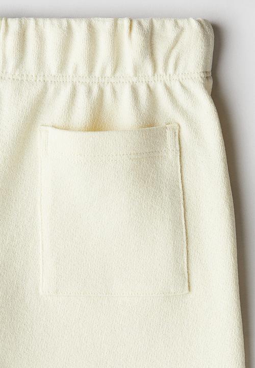 H&M - Textured jersey shorts - light yellow