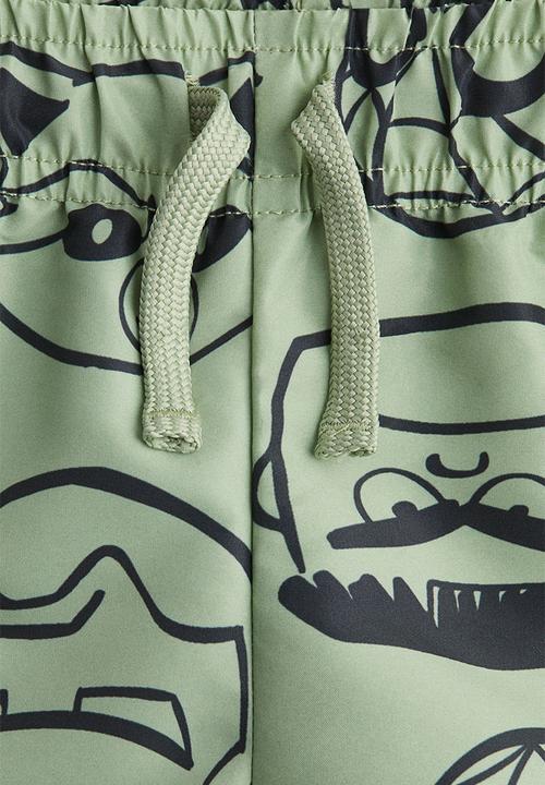 H&M - Printed swim shorts - light green/spidey 