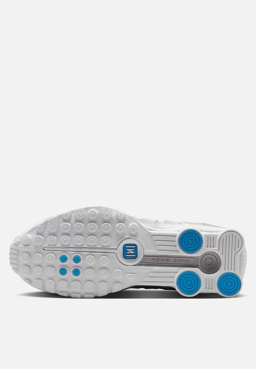 white and blue nike shox