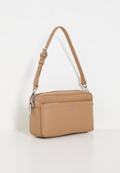 Calvin Klein - CK must convertible camera bag- brown