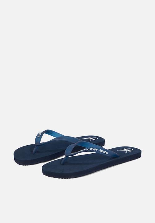 Calvin Klein - Beach sandal transparent tpu - calvin navy/bright white