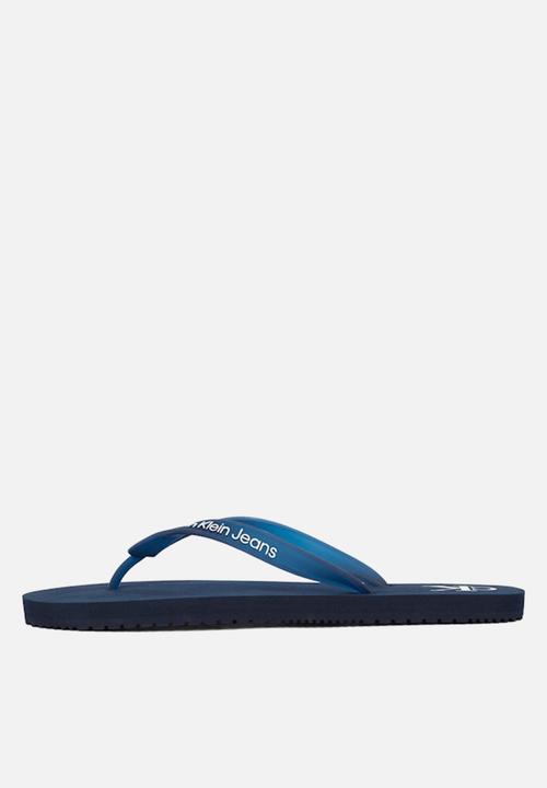 Calvin Klein - Beach sandal transparent tpu - calvin navy/bright white