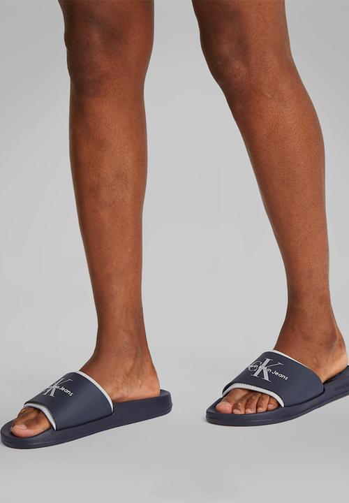 Calvin Klein - SLIDE RUBBER NEOPRENE MONOLOGO - Blue