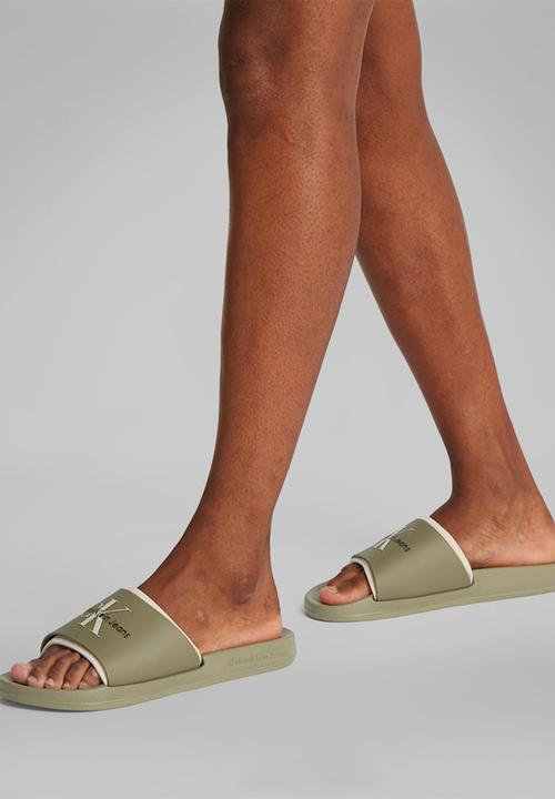 Calvin Klein - SLIDE RUBBER NEOPRENE MONOLOGO- Mermaid/Eggshell