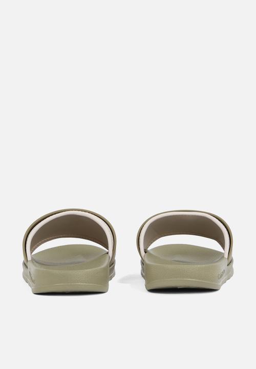 Calvin Klein - SLIDE RUBBER NEOPRENE MONOLOGO- Mermaid/Eggshell