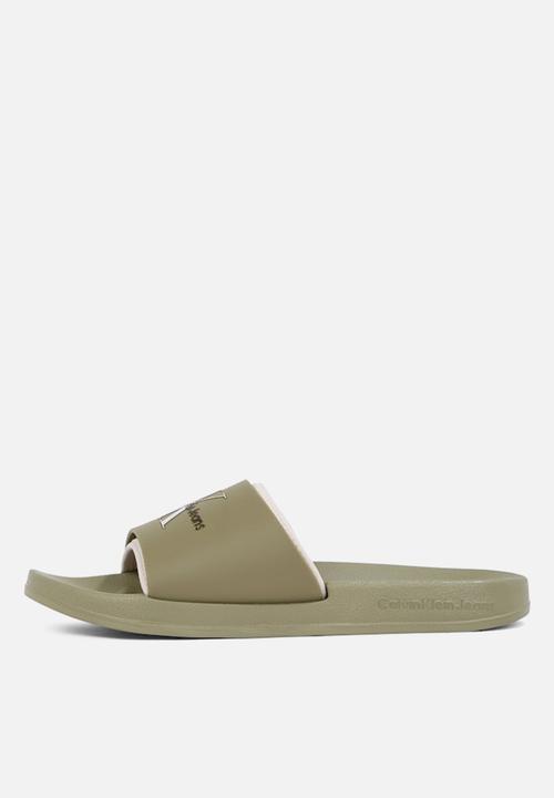 Calvin Klein - SLIDE RUBBER NEOPRENE MONOLOGO- Mermaid/Eggshell