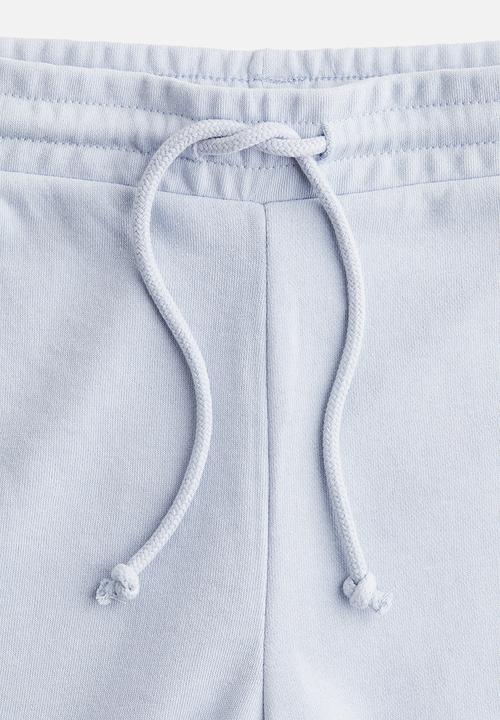 H&M - Flared joggers - light blue 