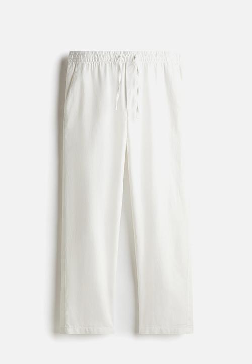 H&M - Relaxed fit linen trousers - cream 