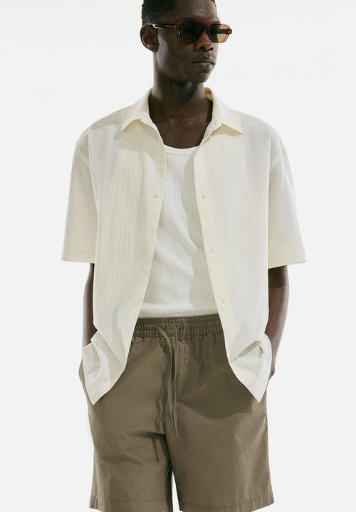 H&M - Regular fit canvas shorts - dark beige