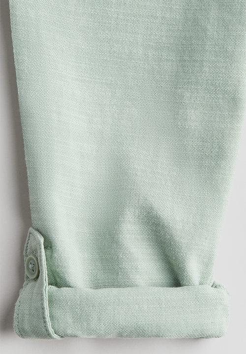 H&M - Cotton roll-up chinos - light green