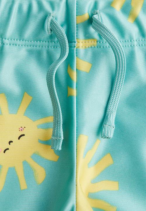 H&M - Printed swimming trunks - turquoise suns 