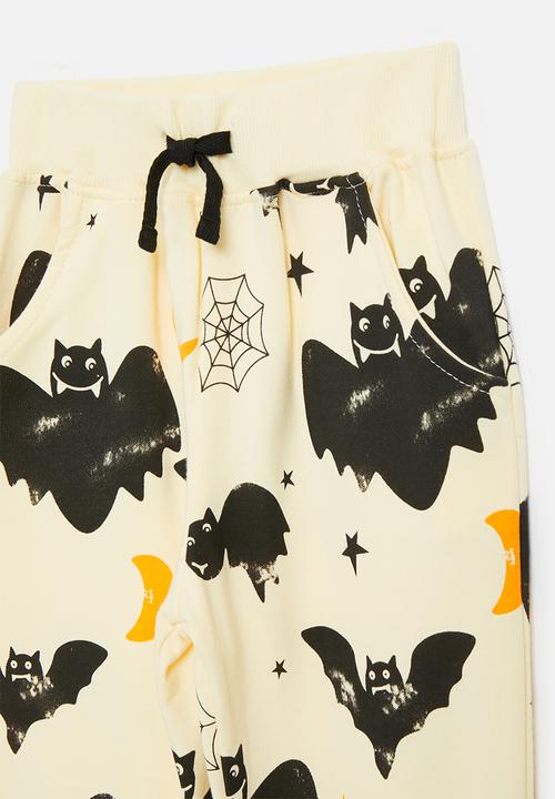 Pop Candy - Bat all-over-print cuffed joggers - light yellow/multi