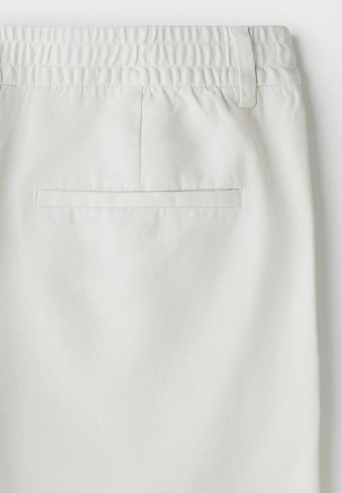 H&M - Relaxed fit lyocell-blend trousers - white
