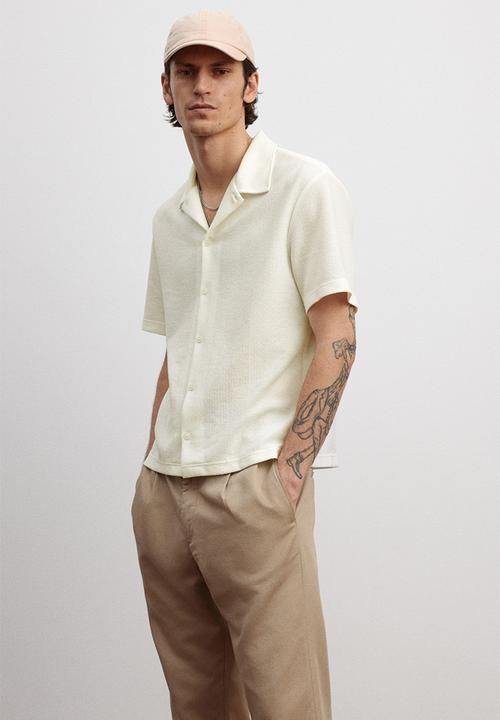 H&M - Regular fit short-sleeved jersey shirt - cream