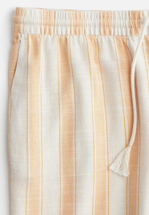 H&M - Straight drawstring trousers - light orange/striped 