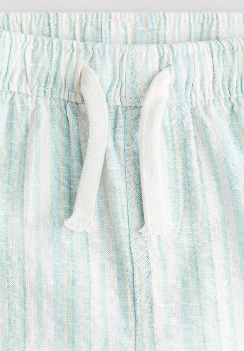 H&M - Linen-blend joggers - light turquoise/striped