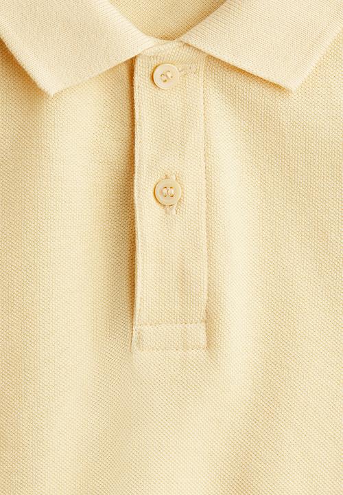 H&M - Cotton piqué polo shirt - yellow