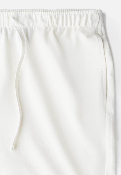 H&M - Relaxed fit knee-length piqué shorts - white
